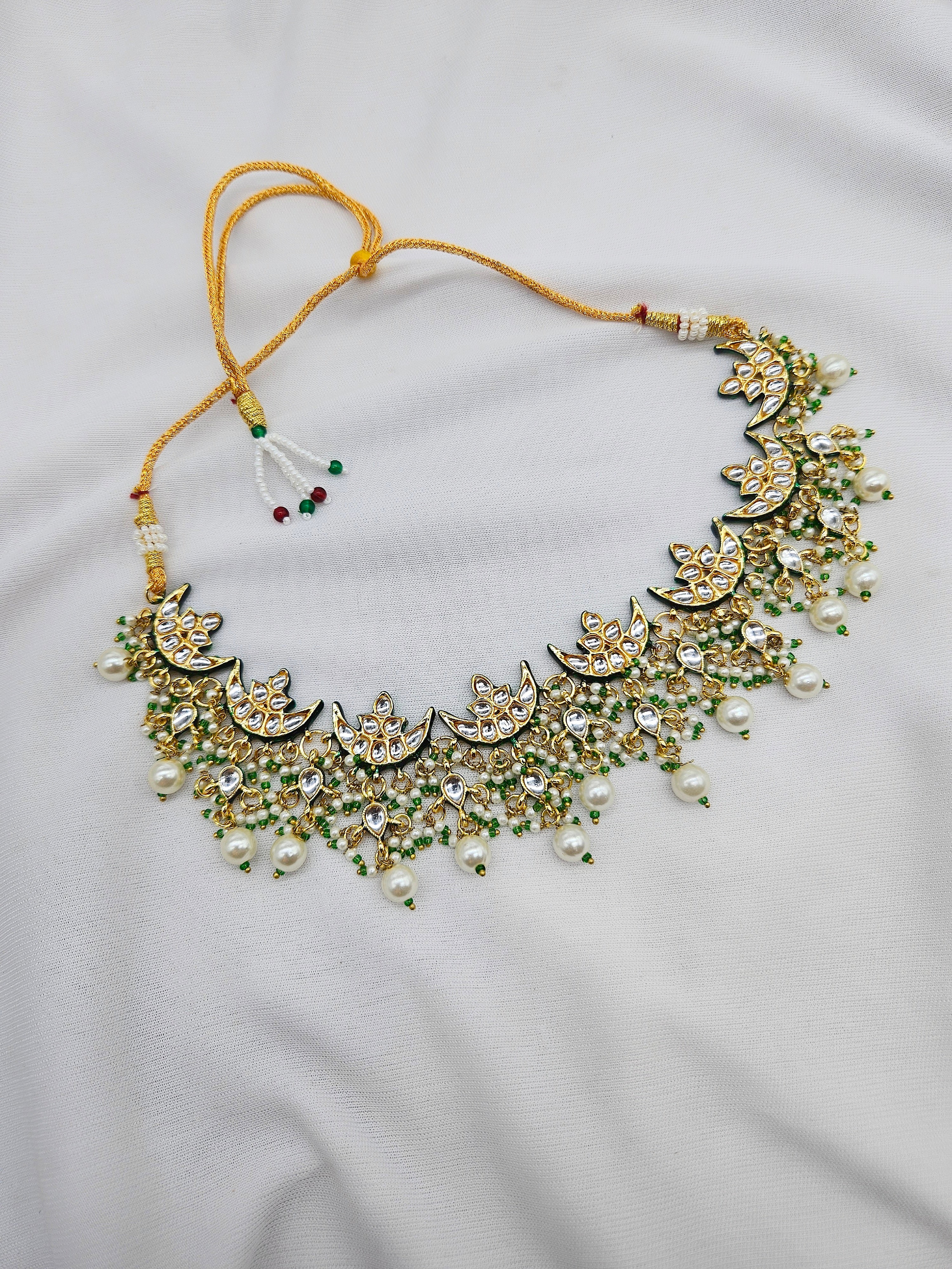 Indriya Demifine Green Kundan Set