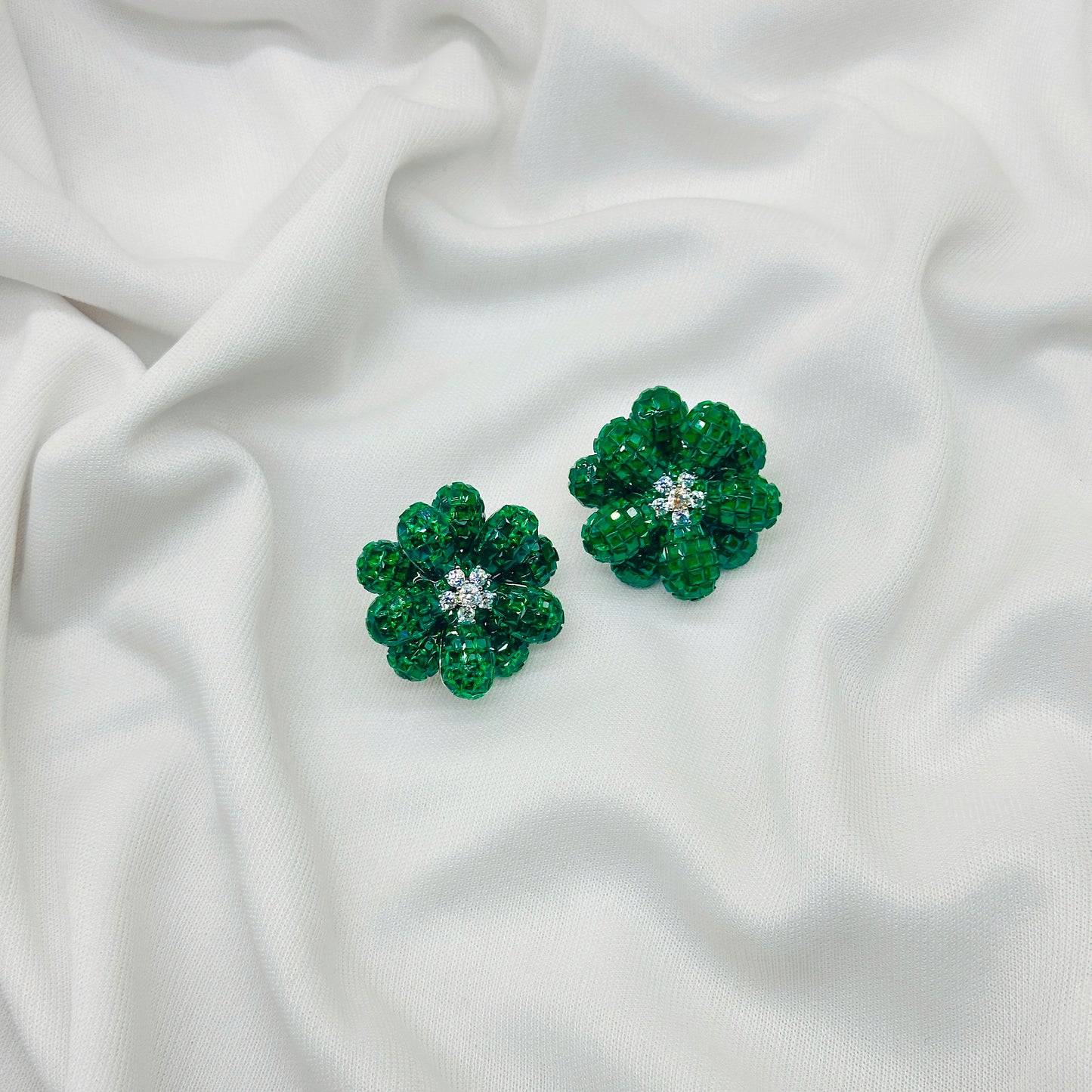 "Diamond-Studded Emerald White Stone Earrings with Green Drop Charm"