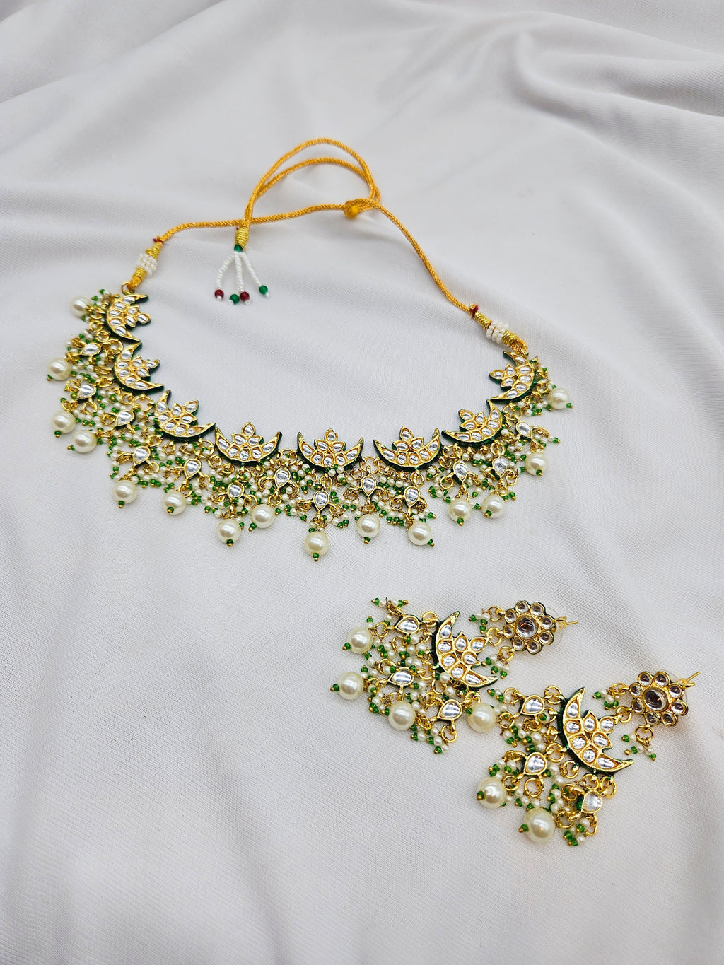 Indriya Demifine Green Kundan Set
