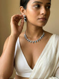 Sky Blue Teardrop Stone Necklace Set with Drop Earrings | Silver Finish Party Wear Jewellery