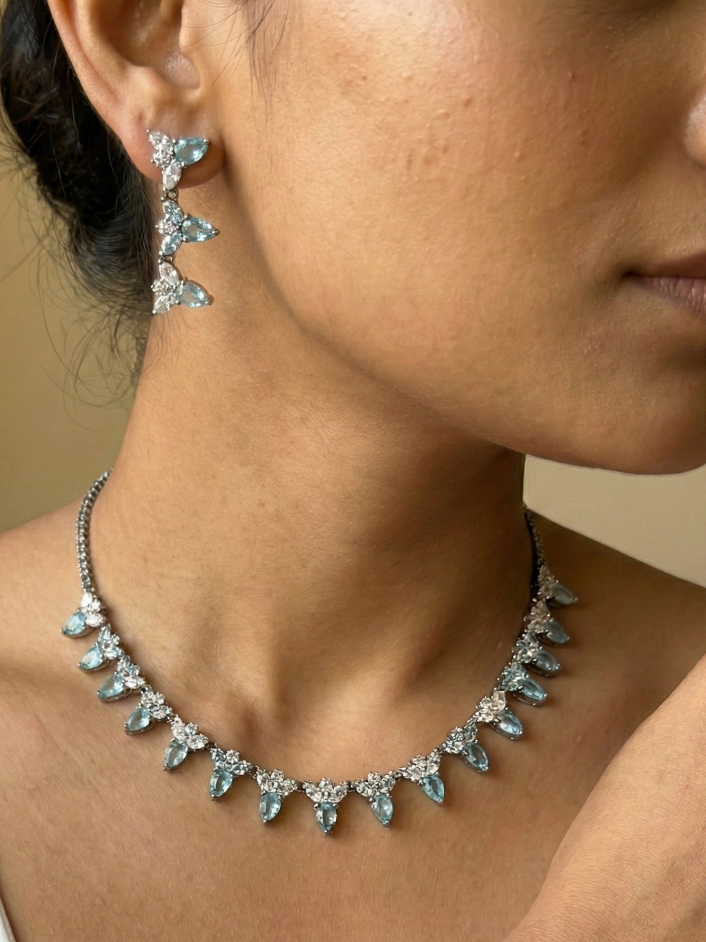 Sky Blue Teardrop Stone Necklace Set with Drop Earrings | Silver Finish Party Wear Jewellery