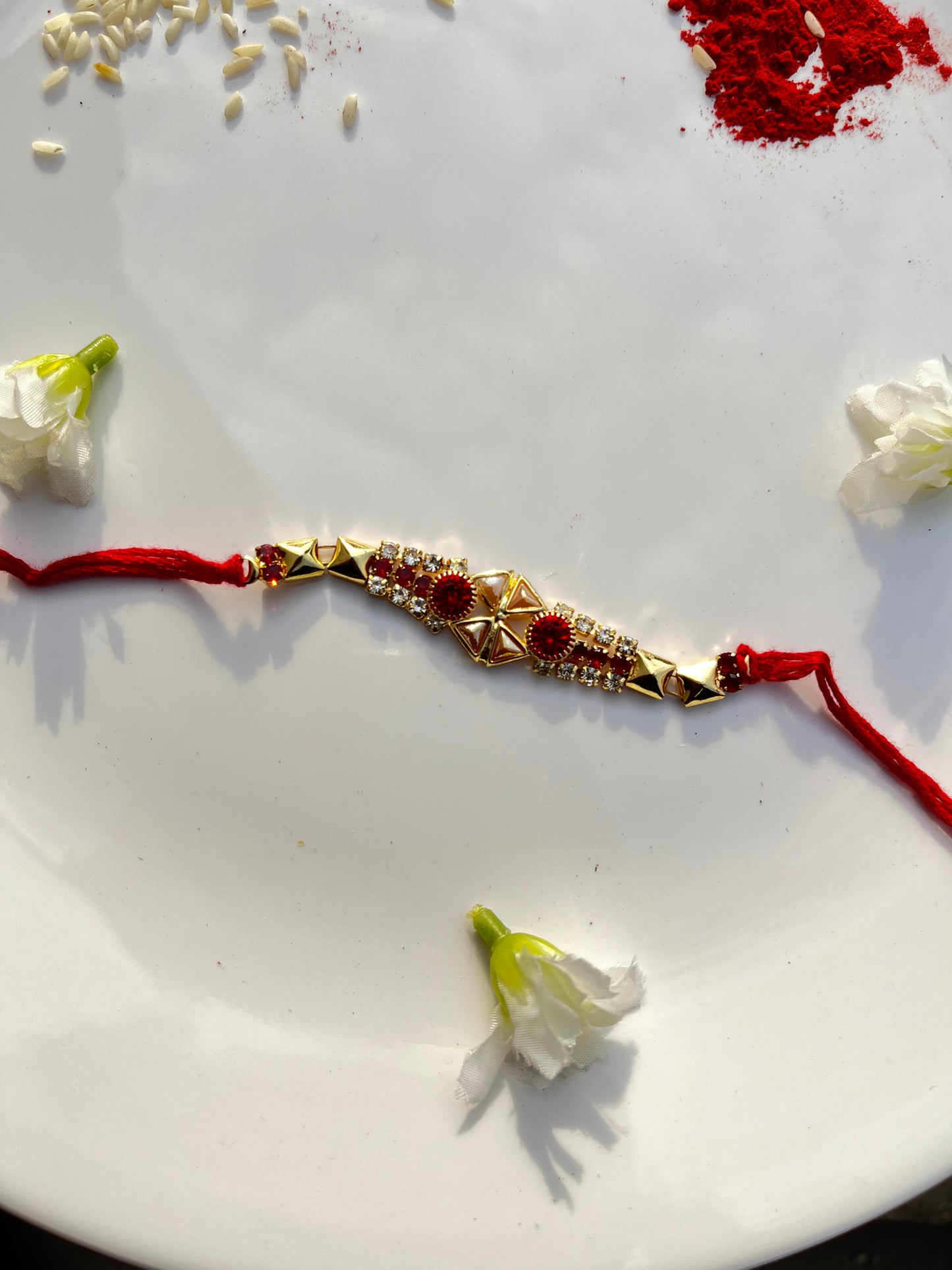 PEARL RED ZIRCON RAKHI