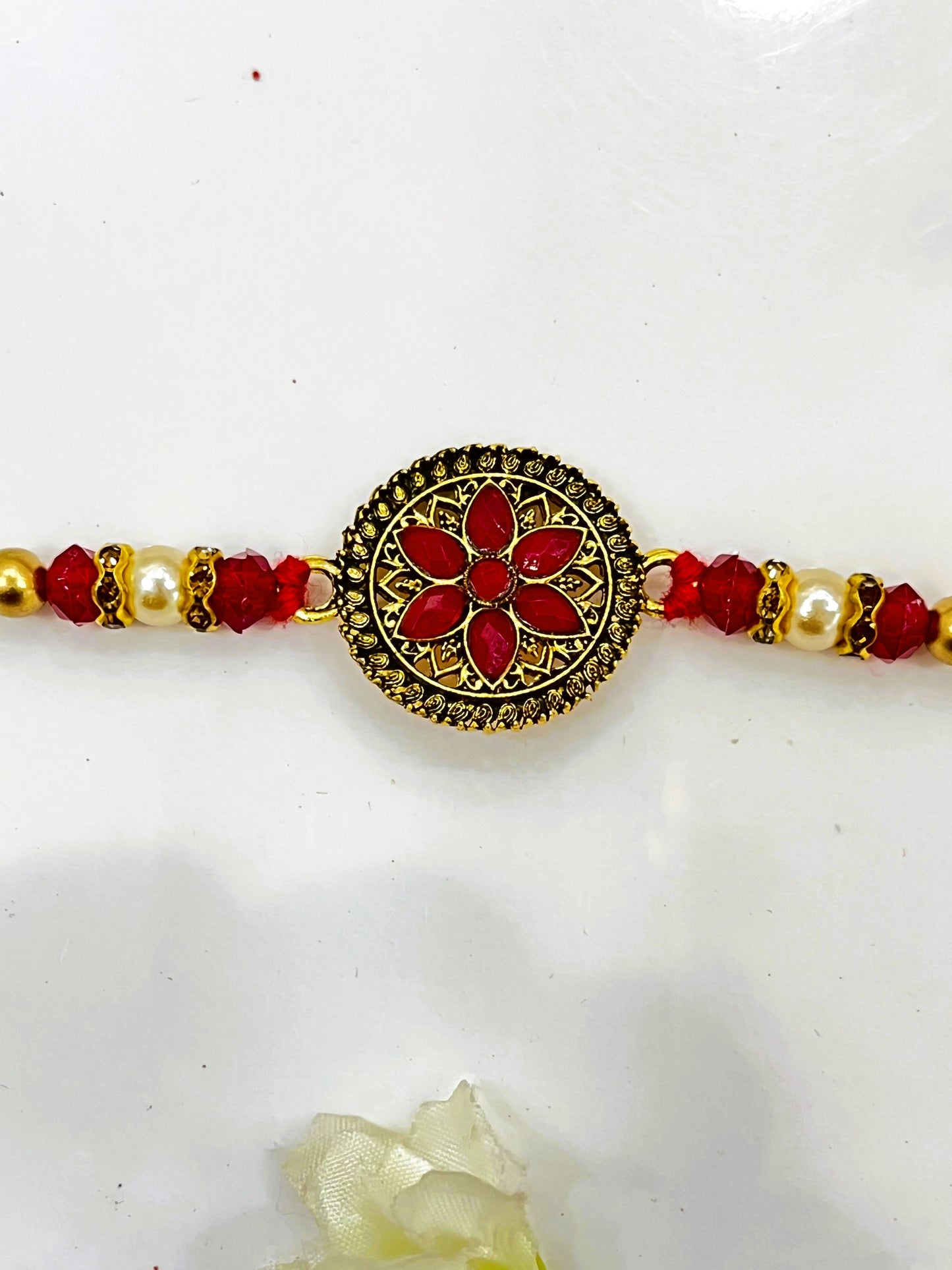 ROUND SHAPE COPPER FLOWER RAKHI