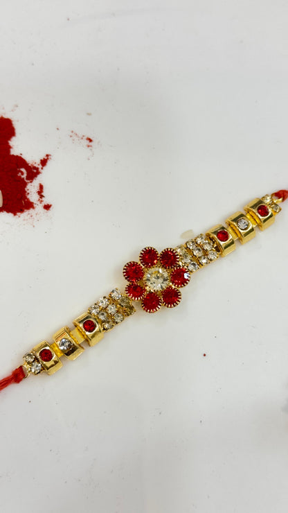 RED ZIRCON FLOWER RAKHI