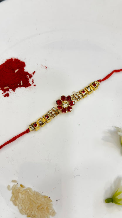 RED ZIRCON FLOWER RAKHI