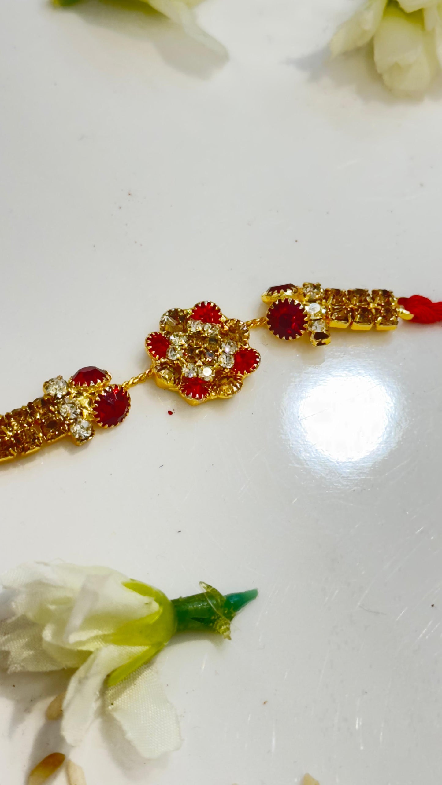 GOLD RED ZIRCON FLOWER  RAKHI