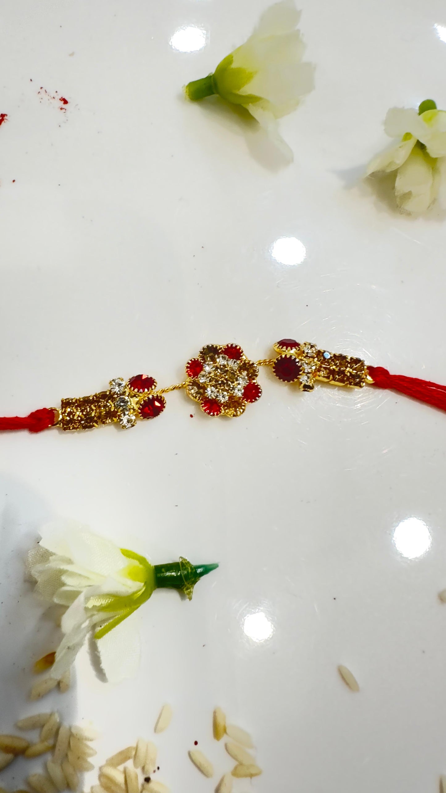 GOLD RED ZIRCON FLOWER  RAKHI