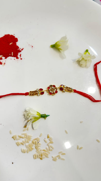 GOLD RED ZIRCON FLOWER  RAKHI