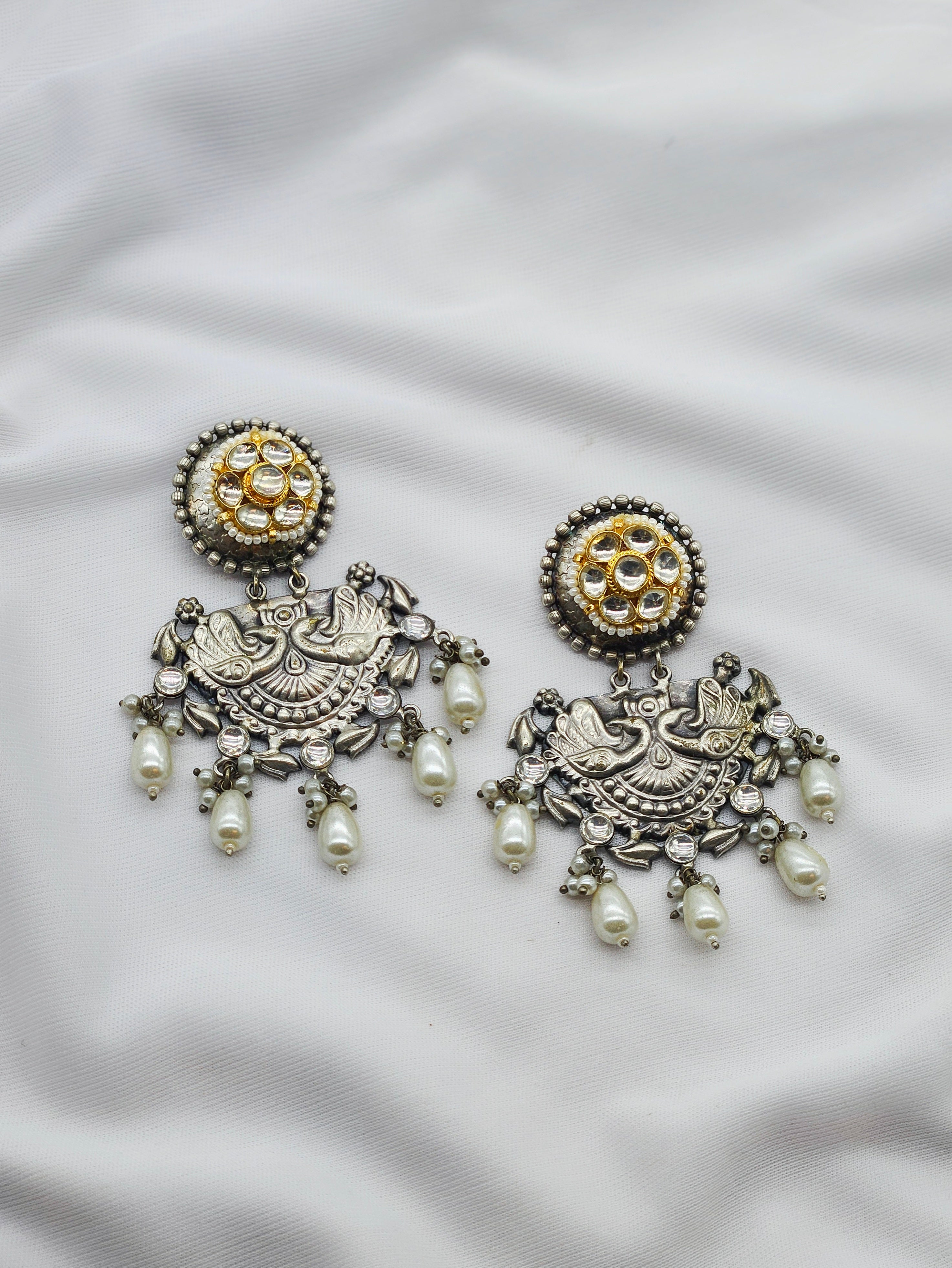 Handcrafted Peacock Oxidized Earrings with golden Gemstones